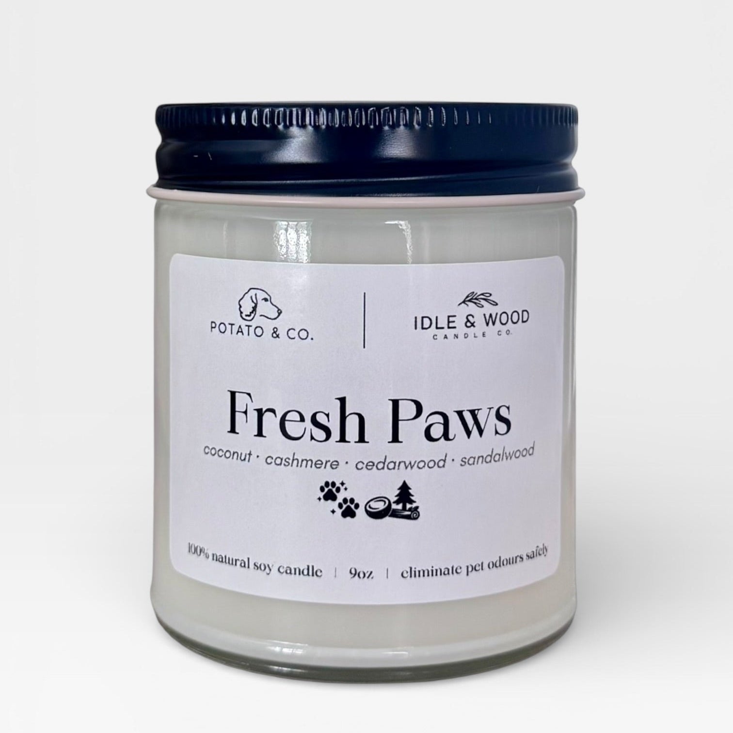 Candle jar labeled 'Fresh Paws' by Idle & Wood on a white background