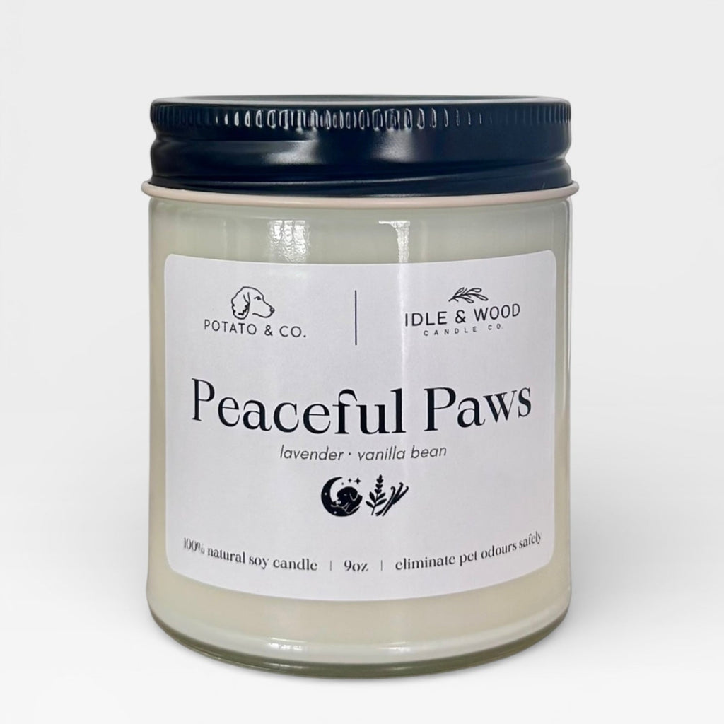 Candle jar labeled 'Peaceful Paws' by Idle & Wood on a white background