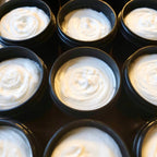 Multiple containers filled with cream