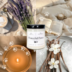 Collage of a candle, 'Peaceful Paws' jar, lavender flowers, vanilla beans, and a book on a soft surface.